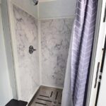 shower trailers-main page stall with stainless steel pan