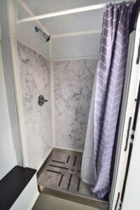 shower trailer stall with stainless steel pan